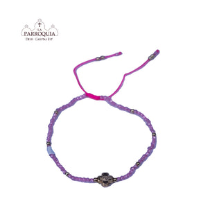 Pulsera rosada cruz dorada